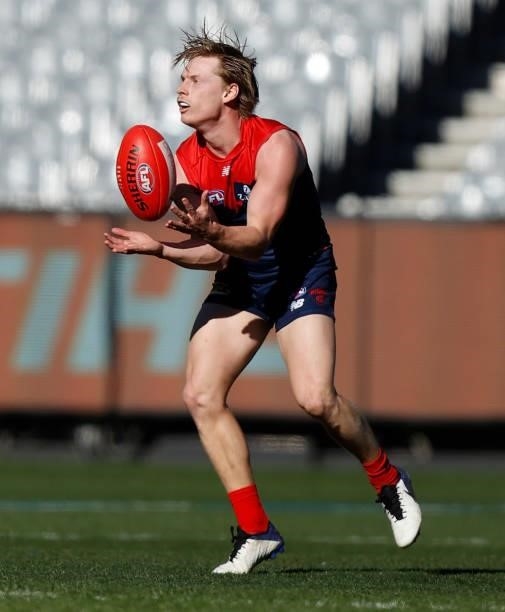 Charlie Spargo of the Demons marks the ball during the 2021 AFL Round 22 match between the Melbourne Demons and the Adelaide Crows at the Melbourne...