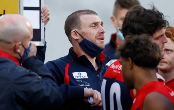 Senior coach Simon Goodwin of the Demons addresses his players during the 2021 AFL Round 22 match between the Melbourne Demons and the Adelaide Crows...