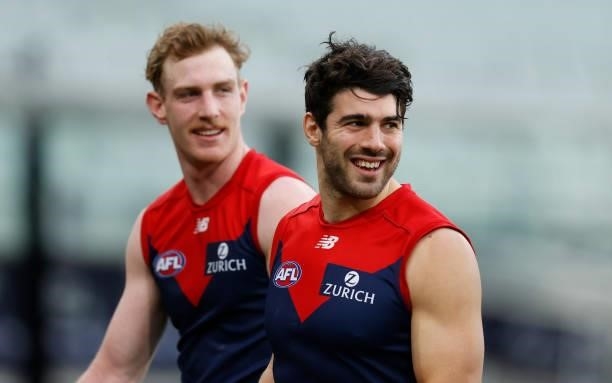 Harrison Petty and Christian Petracca of the Demons celebrate during the 2021 AFL Round 22 match between the Melbourne Demons and the Adelaide Crows...