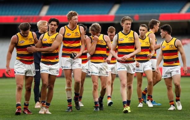 The Crows react after a loss during the 2021 AFL Round 22 match between the Melbourne Demons and the Adelaide Crows at the Melbourne Cricket Ground...