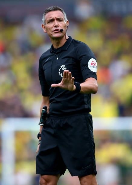 Referee Andre Marriner during the Premier League match between Norwich City and Liverpool at Carrow Road on August 14, 2021 in Norwich, England.