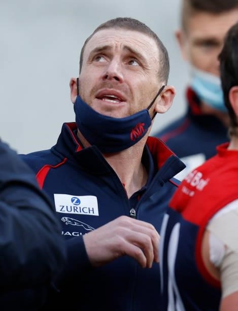 Senior coach Simon Goodwin of the Demons addresses his players during the 2021 AFL Round 22 match between the Melbourne Demons and the Adelaide Crows...