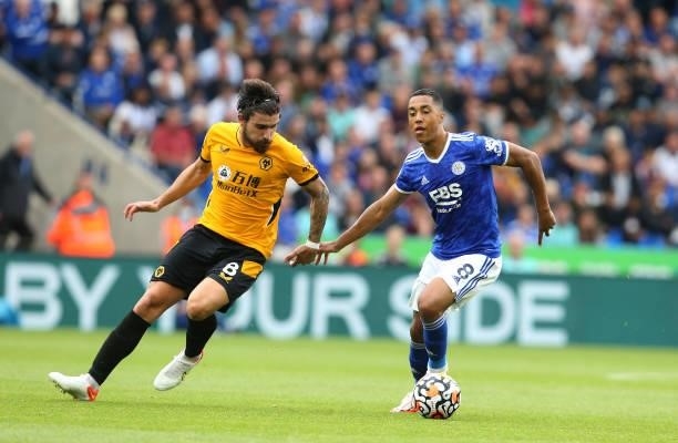 Leicester City's Youri Tielemans shields the ball from Wolverhampton Wanderers' Ruben Neves during the Premier League match between Leicester City...