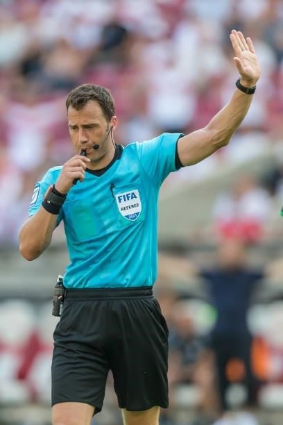 Referee Felix Zwayer gestures during the Bundesliga match between VfB Stuttgart and SpVgg Greuther Fuerth at Mercedes-Benz Arena on August 14, 2021...