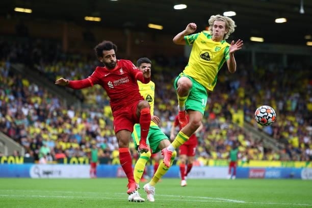 Mohamed Salah of Liverpool in action with Todd Cantwell of Norwich City during the Premier League match between Norwich City and Liverpool at Carrow...