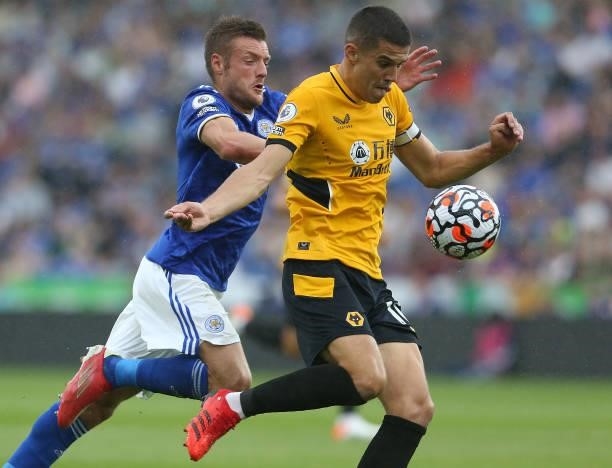 Wolverhampton Wanderers' Conor Coady shields the ball from Leicester City's Jamie Vardy during the Premier League match between Leicester City and...