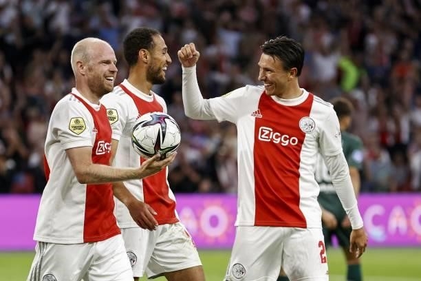 Davy Klaassen of Ajax, Noussair Mazraoui of Ajax, Steven Berghuis of Ajax celebrate the 2-0 during the Dutch Eredivisie match between Ajax Amsterdam...