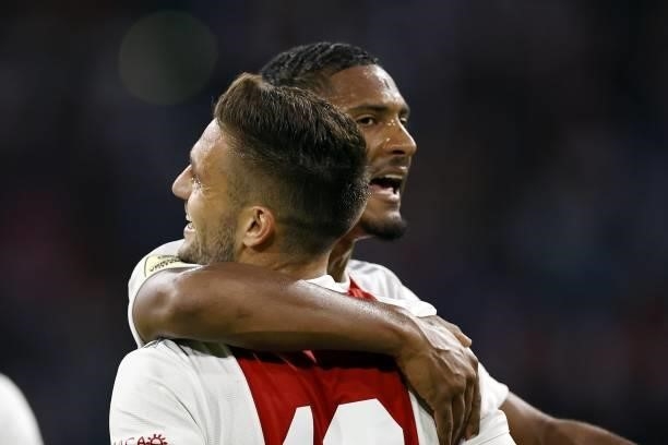 Dusan Tadic of Ajax and Sebastien Haller of Ajax celebrate the 4-0 during the Dutch Eredivisie match between Ajax Amsterdam and NEC Nijmegen at the...