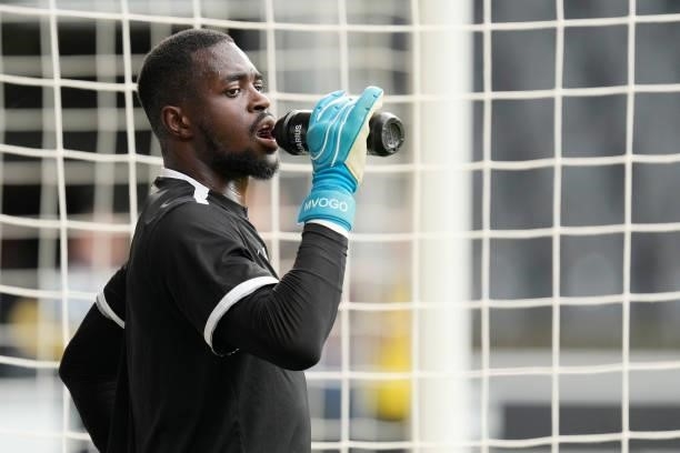 Yvon Mvogo of PSV during the warming up during the Dutch Eredivisie match between Heracles Almelo v PSV at the Polman Stadium on August 14, 2021 in...