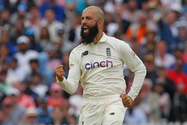 England's Moeen Ali celebrates after taking the wicket of India's Ajinkya Rahane for 61 runs on the fourth day of the second cricket Test match...