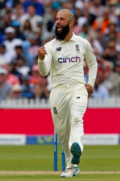 England's Moeen Ali celebrates after taking the wicket of India's Ajinkya Rahane for 61 runs on the fourth day of the second cricket Test match...