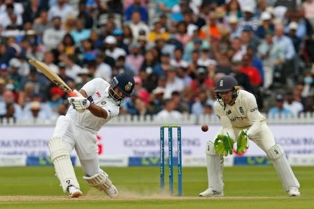India's Rishabh Pant hits a shot as England's Jos Buttler keeps wicket during play on the fourth day of the second cricket Test match between England...