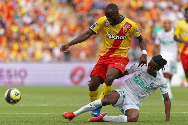 Ignatius Ganago of RC Lens is challenged by Yvan Neyou of AS St-Etienne during the Ligue 1 Uber Eats match between RC Lens and AS Saint Etienne at...