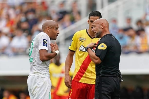 Wahbi Khazri of AS St-Etienne? Florian Sotoca of RC Lens and referee Amaury Delerue during the Ligue 1 Uber Eats match between RC Lens and AS Saint...