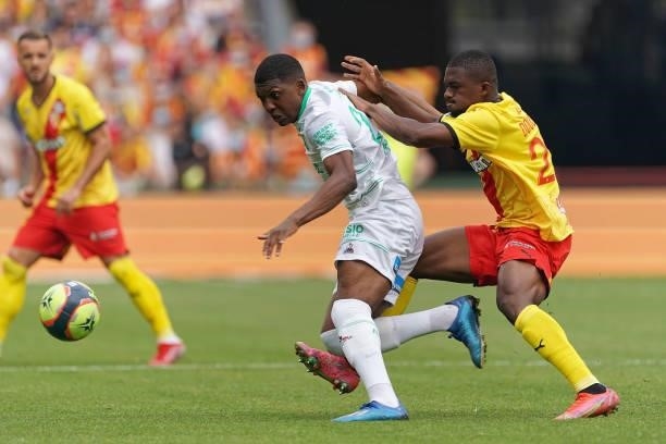 Zaydou Youssouf of AS St-Etienne competes for the ball with Cheick Doucoure of RC Lens during the Ligue 1 Uber Eats match between RC Lens and AS...