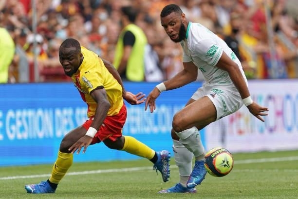Ignatius Ganago of RC Lens competes for the ball with Harold Moukoudi of AS St-Etienne during the Ligue 1 Uber Eats match between RC Lens and AS...