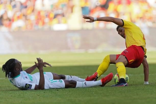 Yvan Neyou of AS St-Etienne competes for the ball with Facundo Medina of RC Lens during the Ligue 1 Uber Eats match between RC Lens and AS Saint...