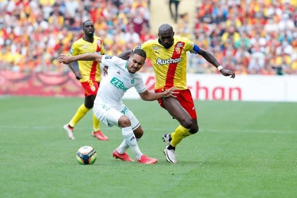 Seko Fofana of RC Lens battles for the ball against Yvann Macon of AS Saint-Etienne during the Ligue 1 Uber Eats match between Lens and Saint Etienne...