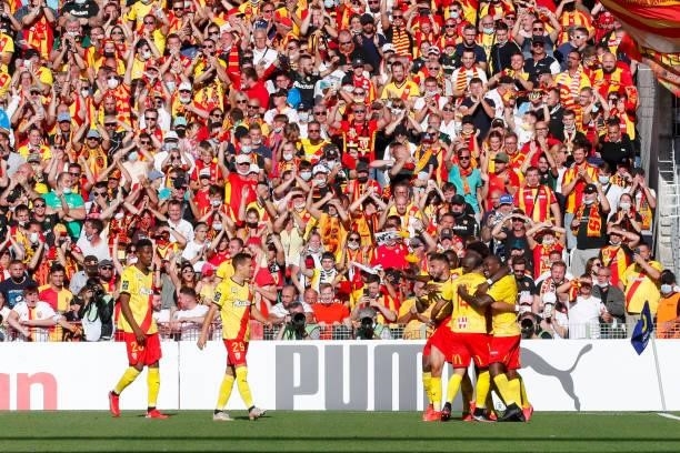Seko Fofana of RC Lens celebrates his goal with his teammates during the Ligue 1 Uber Eats match between Lens and Saint Etienne at Stade...