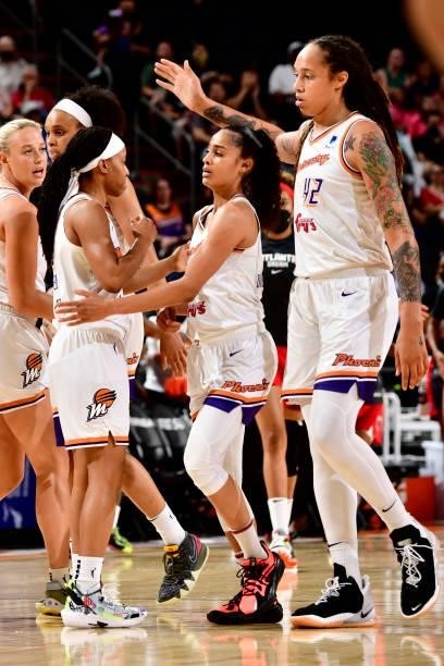Brittney Griner and Skylar Diggins-Smith of the Phoenix Mercury celebrate with teammates during the game against the Atlanta Dream on August 15, 2021...