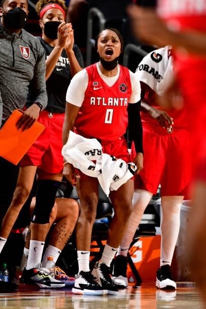 Odyssey Sims of the Atlanta Dream and teammates celebrate during the game against the Phoenix Mercury on August 15, 2021 at Footprint Center in...