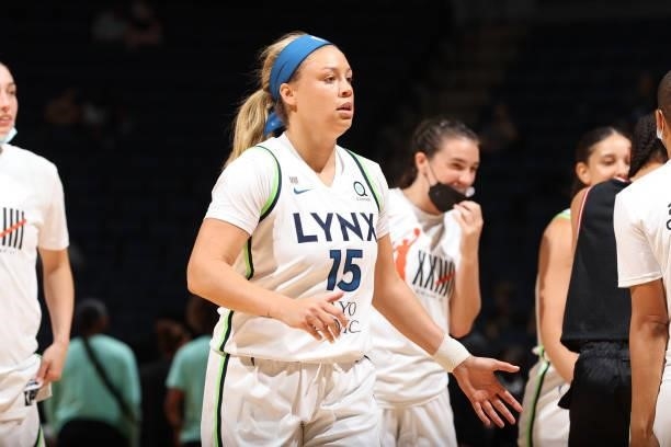Rachel Banham of the Minnesota Lynx hi-fives teammates during the game against the New York Liberty on August 15, 2021 at Target Center in...