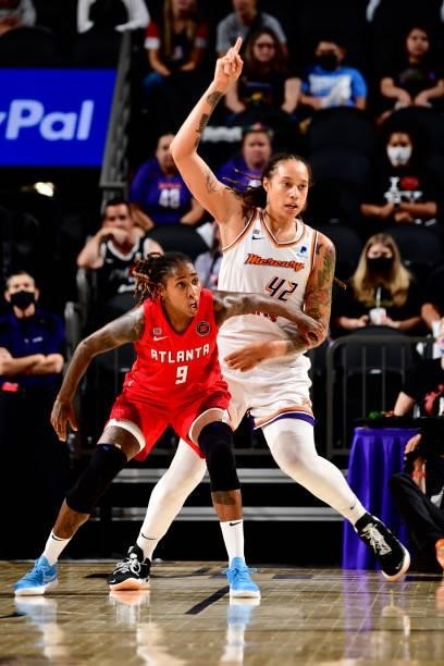 Crystal Bradford of the Atlanta Dream and Brittney Griner of the Phoenix Mercury fight for position during the game on August 15, 2021 at Footprint...