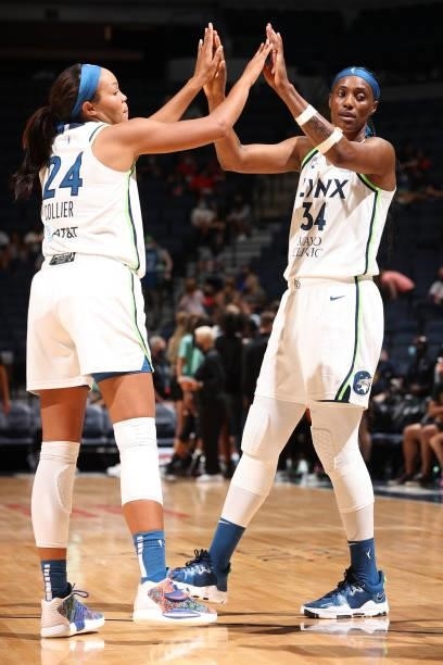 Napheesa Collier hi-fives Sylvia Fowles of the Minnesota Lynx during the game against the New York Liberty on August 15, 2021 at Target Center in...
