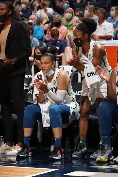 Kayla McBride and Crystal Dangerfield of the Minnesota Lynx look on during the game against the New York Liberty on August 15, 2021 at Target Center...