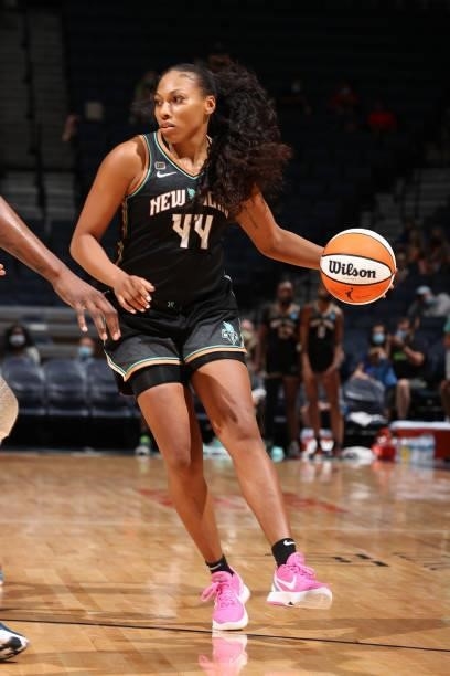 Betnijah Laney of the New York Liberty dribbles the ball during the game against the Minnesota Lynx on August 15, 2021 at Target Center in...