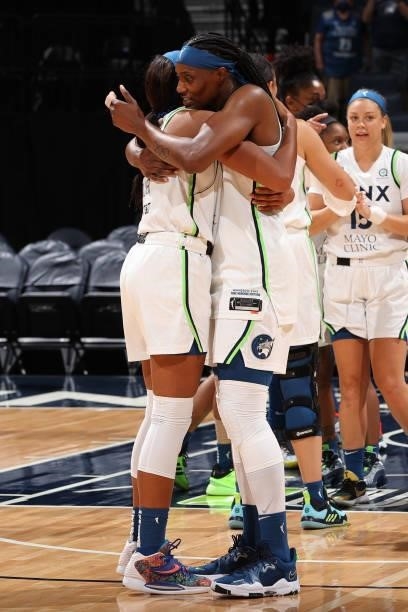 Napheesa Collier celebrates with Sylvia Fowles of the Minnesota Lynx after the game against the New York Liberty on August 15, 2021 at Target Center...