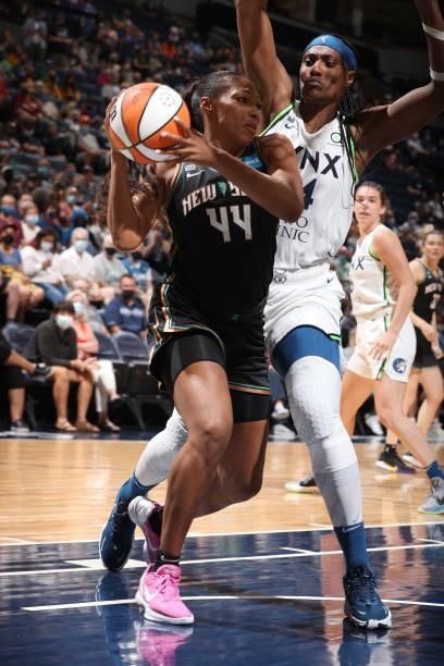 Betnijah Laney of the New York Liberty handles the ball during the game against the Minnesota Lynx on August 15, 2021 at Target Center in...