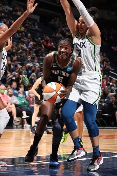 Natasha Howard of the New York Liberty drives to the basket during the game against the Minnesota Lynx on August 15, 2021 at Target Center in...