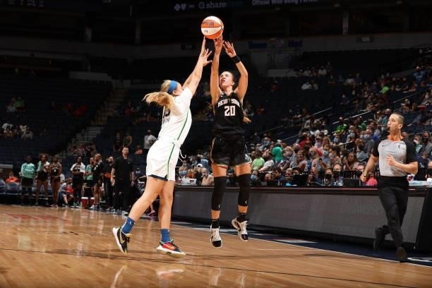 Sabrina Ionescu of the New York Liberty shoots a three point basket during the game against the Minnesota Lynx on August 15, 2021 at Target Center in...