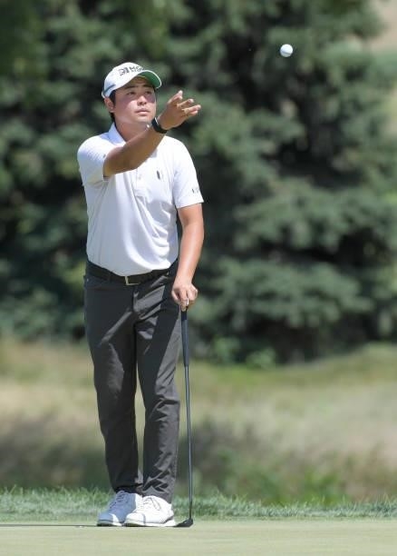 John Oda catches his golf ball on the first green during the final round of the Korn Ferry Tours Pinnacle Bank Championship presented by Aetna at The...