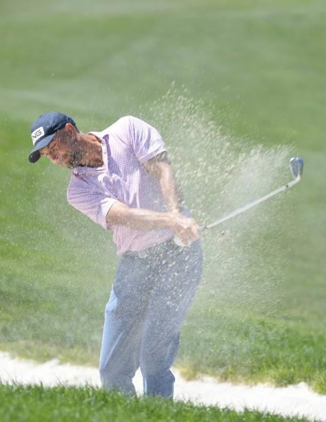 Steve Lewton plays a bunker shot on the first hole during the final round of the Korn Ferry Tours Pinnacle Bank Championship presented by Aetna at...