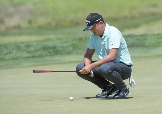 Kevin Yu lines his putt on the first hole during the final round of the Korn Ferry Tours Pinnacle Bank Championship presented by Aetna at The Club at...