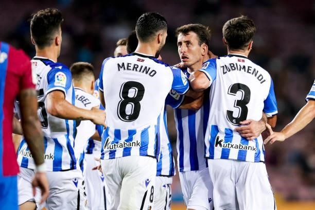 Mikel Oyarzabal of Real Sociedad with Mikel Merino of Real Sociedad, Martin Zubimendi of Real Sociedad celebrates goal 3-2 during the La Liga...