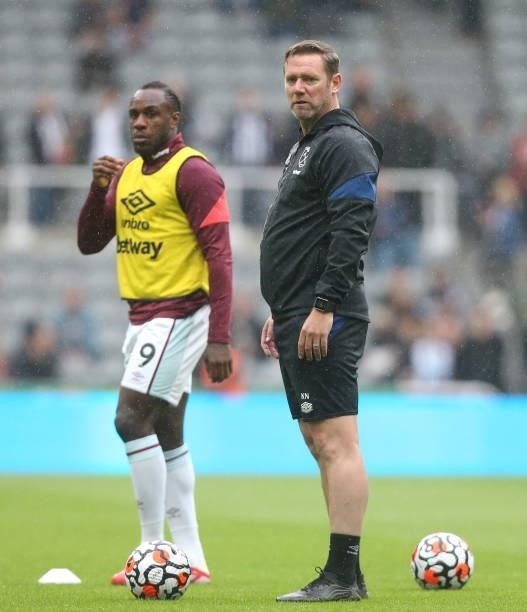 West Han United's coach Kevin Nolan during the Premier League match between Newcastle United and West Ham United at St. James Park on August 14, 2021...