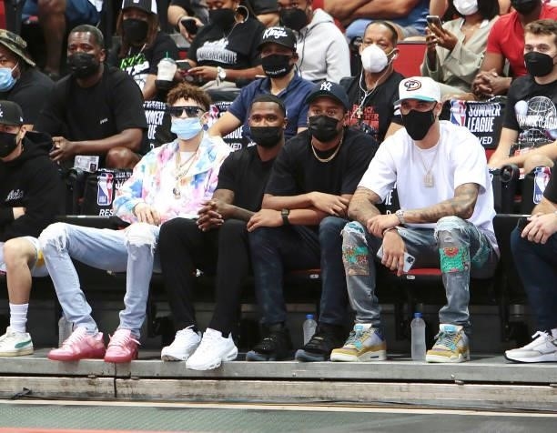 LaMelo Ball of the Charlotte Hornets, Lonzo Ball of the Chicago Bulls and friends attend a game during the 2021 Las Vegas Summer League on August 12,...