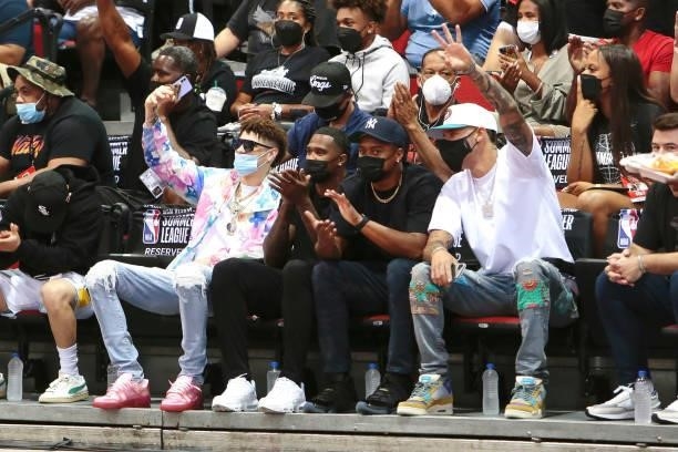 LaMelo Ball of the Charlotte Hornets, Lonzo Ball of the Chicago Bulls and friends attend a game during the 2021 Las Vegas Summer League on August 12,...
