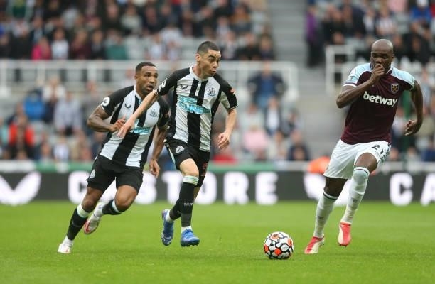 Newcastle United's Miguel Almiron and West Ham United's Angelo Ogbonna during the Premier League match between Newcastle United and West Ham United...