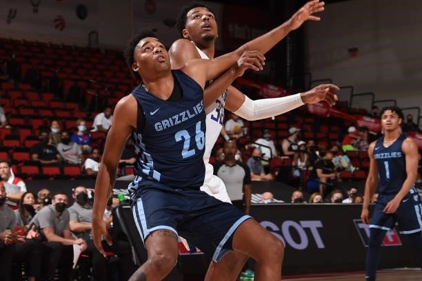 Ben Moore of Memphis Grizzlies and Kaleb Wesson of the LA Clippers fight for position during the 2021 Las Vegas Summer League on August 16, 2021 at...