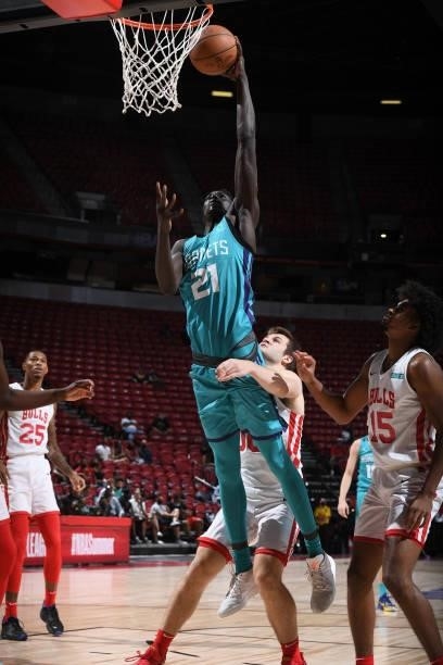Xavier Sneed of the Charlotte Hornets drives to the basket against the Chicago Bulls during the 2021 Las Vegas Summer League on August 16, 2021 at...