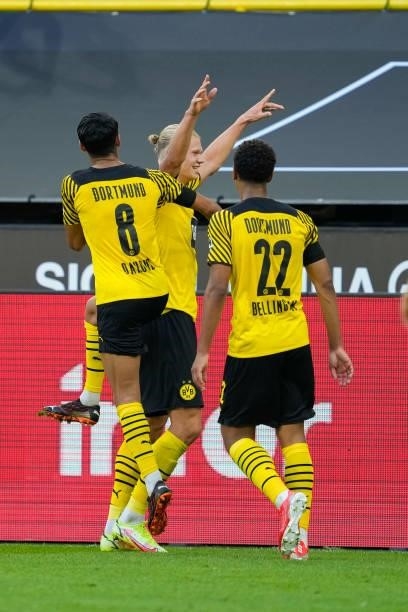 Erling Haaland of Borussia Dortmund celebrates after scoring his team's third goal with teammates during the Bundesliga match between Borussia...