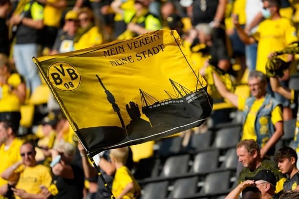 Fans of Borussia Dortmund with a flag prior to the Bundesliga match between Borussia Dortmund and Eintracht Frankfurt at Signal Iduna Park on August...