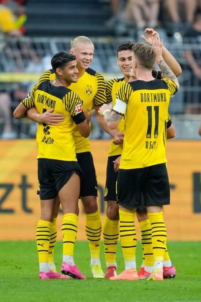Erling Haaland of Borussia Dortmund celebrates after scoring his team's fifth goal with teammates during the Bundesliga match between Borussia...