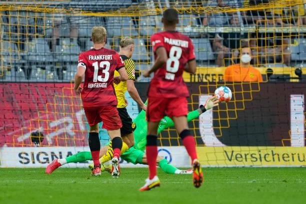Erling Haaland of Borussia Dortmund scores his team's fifth goal during the Bundesliga match between Borussia Dortmund and Eintracht Frankfurt at...