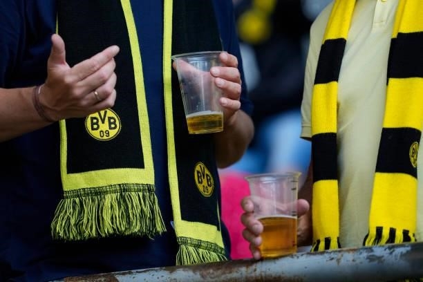 Fans of Borussia Dortnund with beer cups prior to the Bundesliga match between Borussia Dortmund and Eintracht Frankfurt at Signal Iduna Park on...