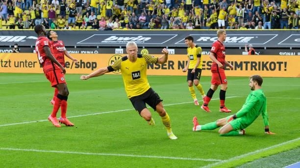 Erling Haaland of Borussia Dortmund cheers after Thorgan Hazard of Borussia Dortmund scores 2:1 during the Bundesliga match between Borussia Dortmund...